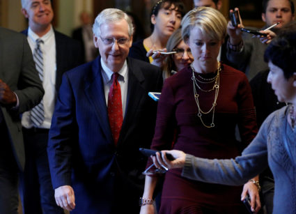 Senate Majority Leader Mitch McConnell (R-KY) walks to his office on Capitol Hill. McConnell said Monday that Democrats were conducting a "smear campaign" against Supreme Court nominee Brett Kavanaugh. REUTERS/Joshua Roberts