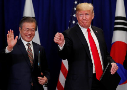 U.S. President Donald Trump and South Korean President Moon Jae-in gesture after signing the U.S.-Korea Free Trade Agreementon during a ceremony on the sidelines of the 73rd United Nations General Assembly in New York on September 24, 2018. REUTERS/Carlos Barria