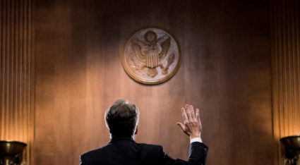 Judge Brett Kavanaugh is sworn in before testifying before the U.S. Senate Judiciary Committee on Capitol Hill in Washington, D.C. Photo by Tom Williams/Reuters