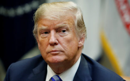 File photo of President Donald Trump by Leah Millis/Reuters