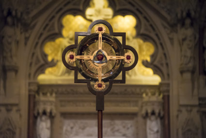 NEW YORK CITY, NEW YORK, UNITED STATES - 2015/10/17: Details of Trinity church New York city: Holy cross design mounted on a pole inside the Trinity Church, Manhattan. Trinity Church, at 75 Broadway in lower Manhattan, is a historic, active, well-endowed parish church in the Episcopal Diocese of New York. (Photo by Roberto Machado Noa/LightRocket via Getty Images)