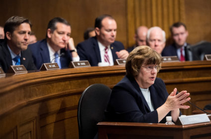 Rachel Mitchell, counsel for Senate Judiciary Committee Republicans, questions Christine Blasey Ford as senators Ben Sasse, Ted Cruz, Mike Lee and John Cornyn listen during the Senate Judiciary Committee hearing on Capitol Hill in Washington, DC, U.S., September 27, 2018. Tom Williams/Pool via REUTERS