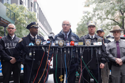 What motivated the mail bomb suspect?