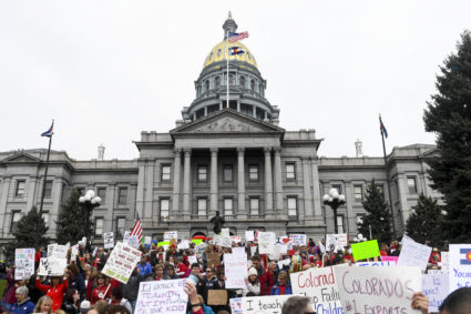 DENVER, CO - APRIL 26: Educators gather en masse wearing red and holding signs during a teachers rally for more educational funding at the Colorado State Capitol on Thursday, April 26, 2018. The Colorado Education Association said the walkouts are necessary to alert residents and lawmakers about the status of school funding in Colorado. The states schools are currently underfunded by $822 million and are $2,700 below the national average in per-pupil funding, the CEA said. (Photo by AAron Ontiveroz/The Denver Post via Getty Images)The Colorado state senate is one of several state legislative chambers around the country that could change hands after the November elections. (File photo by Joe Amon/The Denver Post via Getty Images)