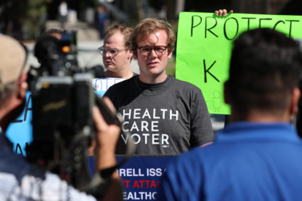 Student Aiden Beals speaks at a SoCal Health Care Coalition protest at UC San Diego in La Jolla, California on October 12, 2017. Photo by Mike Blake/Reuters