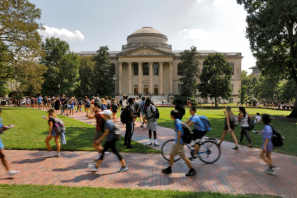 Students walk past Wilson Library on the campus of the University of North Carolina at Chapel Hill. Photo by Jonathan Drake/Reuters