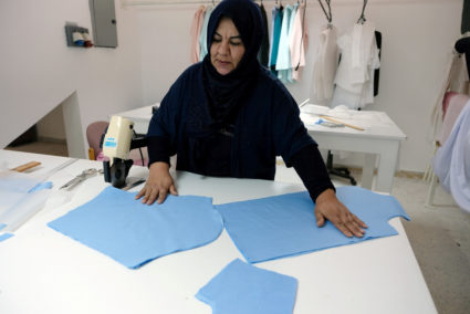 A woman works in a sewing workshop supervised by a charity to help widows, divorcees and needy in Benghazi, Libya on Sept. 22. Photo by Esam Omran Al-Fetori/Reuters