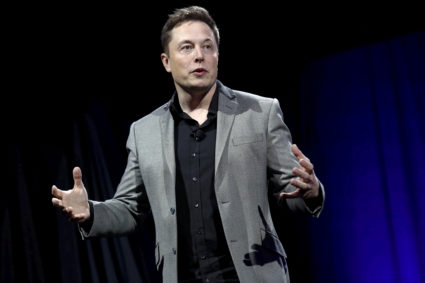 Tesla Motors CEO Elon Musk reveals the Tesla Energy Powerwall Home Battery during an event in Hawthorne, California, on April 30, 2015. Photo by Patrick T. Fallon/Reuters