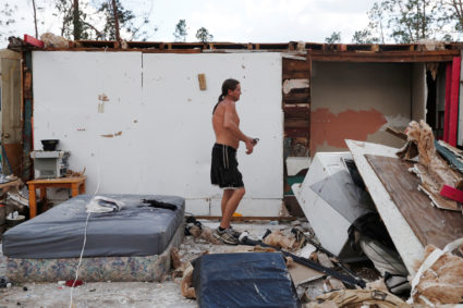 Gabriel Schaw, 40, walks through the remains of his home destroyed by Hurricane Michael in Fountain, Florida. Photo by Terray Sylvester/Reuters