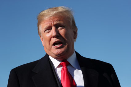 U.S. President Donald Trump talks to reporters about journalist Jamal Khashoggi's disappearance prior to boarding Air Force One for travel to Montana from Joint Base Andrews. Photo by Jonathan Ernst/Reuters