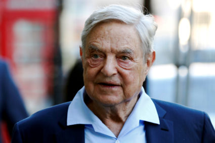 Business magnate George Soros arrives to speak at the Open Russia Club in London, Britain. Photo by Luke MacGregor/Reuters
