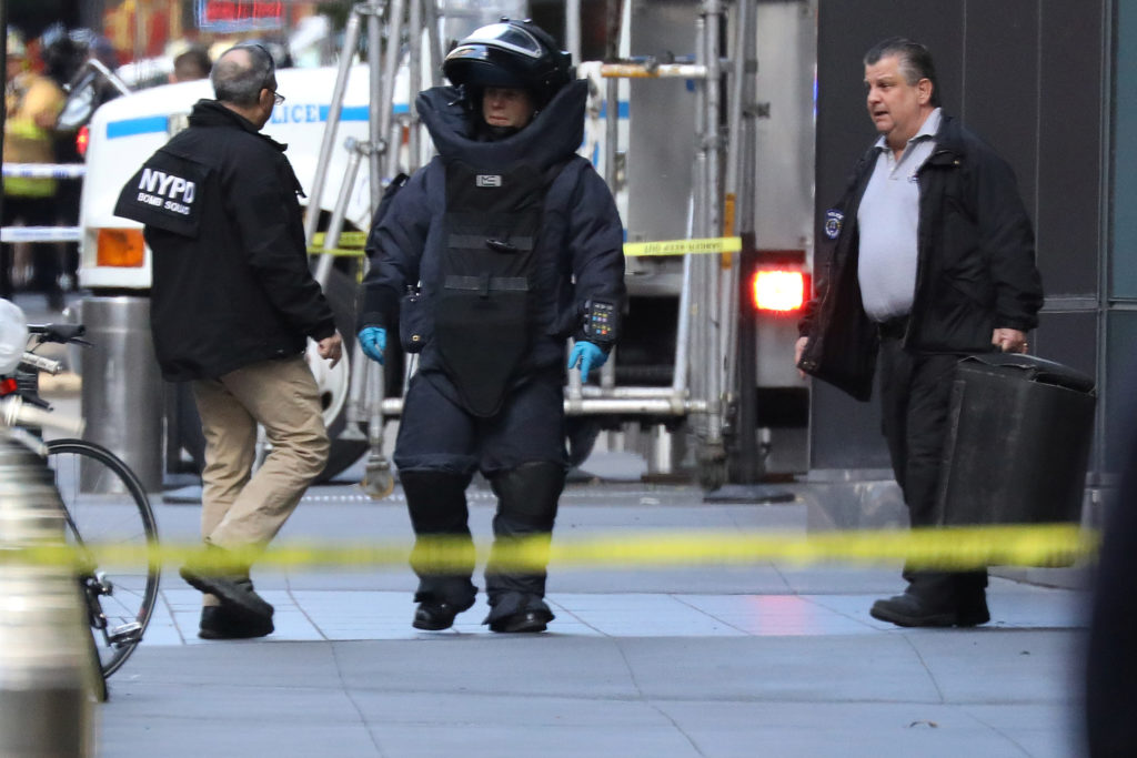 A member of the New York Police Department bomb squad is pictured outside the Time Warner Center in the Manahattan borough...