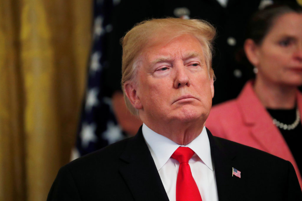 President Donald Trump listens during an event in the East Room of the White House on the administration efforts to "comba...