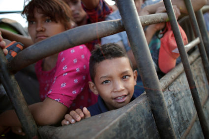 Thousands of migrants are traveling north from Central America. Photo by Ueslei Marcelino/Reuters