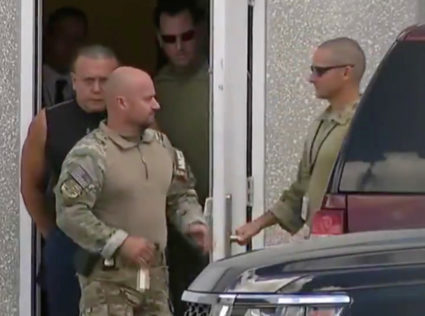 Cesar Altieri Sayoc, who was arrested during an investigation into a series of parcel bombs, is escorted from an FBI facility in Miramar, Florida October 26, 2018 in a still image from video. WPLG/Local10.com/Handout via Reuters