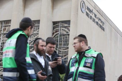 A crew from Chesed Shel Emes Emergency Services and Recovery Unit arrive at the Tree of Life synagogue where 11 worshippers were shot dead during Saturday's shooting at the synagogue in Pittsburgh, Pennsylvania. Photo by Cathal McNaughton/Reuters
