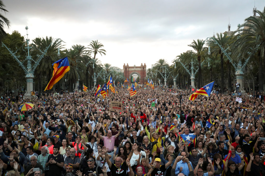People attend a demonstration on the first anniversary of Catalonia's banned October 1, 2017 referendum on indpendence in ...