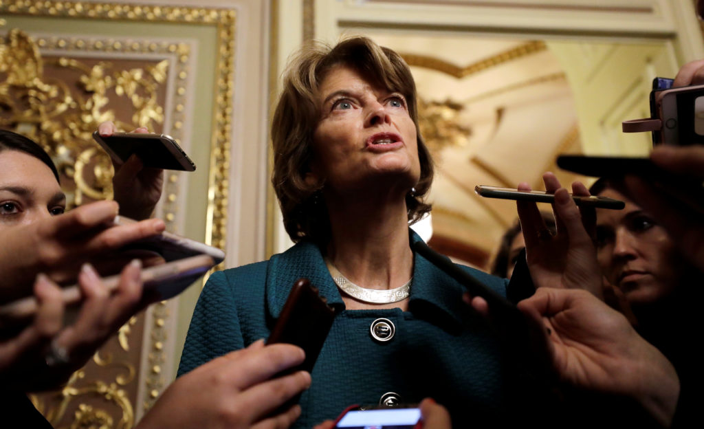 U.S. Senator Lisa Murkowski (R-AK) talks to reporters about her "no" vote after a procedural vote in the Senate on the con...