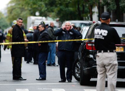 First respondents are seen on the scene where suspicious package was found in Midtown Manhattan on October 26, 2018 in New York City. - Democratic US Senator Cory Booker and former Director of National Intelligence James Clapper are the latest target in a spree of 12 suspicious packages sent to opponents of Donald Trump, the FBI said Friday. (Photo by KENA BETANCUR / AFP) (Photo credit should read KENA BETANCUR/AFP/Getty Images)