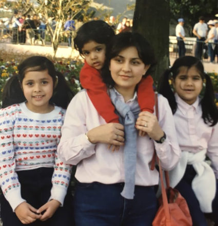 Seema Ahmed (center) is pictured here with her daughters (left to right) Sharmeen Qureshi, Naureen Ahmed and Mehreen Siddiqui. Photo courtesy of the Ahmed family
