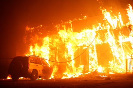 A structure is seen engulfed in flames during the Camp Fire in Paradise, California, U.S. November 8, 2018. Photo by REUTERS/Stephen Lam