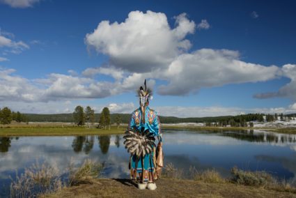 North America, USA, Rocky Mountains, Yellowstone, National Park, Hayden river,, Robert Yellowhawk, Lakota indian at river MR. (Photo by: Prisma by Dukas/UIG via Getty Images)