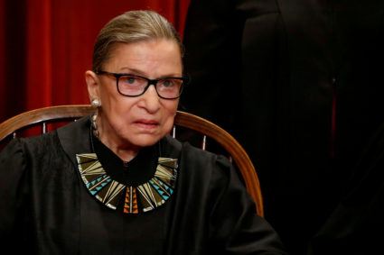 U.S. Supreme Court Justice Ruth Bader Ginsburg participates in taking a new family photo with her fellow justices at the Supreme Court building in Washington, D.C., U.S., June 1, 2017. Photo by Jonathan Ernst/Reuters.