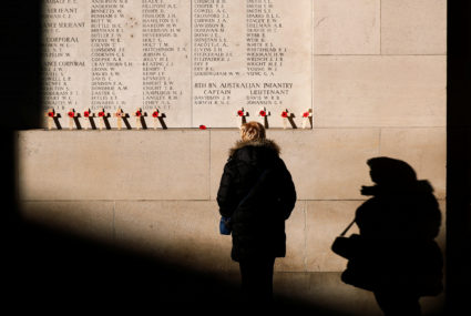 A visitor looks at engraved names of British and Commonwealth soldiers who died in World War One at the Menin Gate Memorial in Ypres, Belgium, on Nov. 8. Photo by Francois Lenoir/Reuters