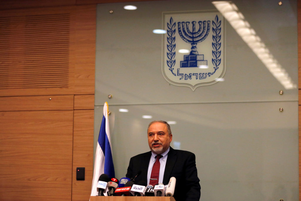 Israel's Defence Minister Avigdor Lieberman delivers a statement to the media following his party, Yisrael Beitenu, factio...