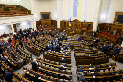 Lawmakers wait for a parliament session to review a proposal by Ukrainian President Petro Poroshenko to introduce martial law for 60 days after Russia seized Ukrainian naval ships off the coast of Russia-annexed Crimea, in Kiev, Ukraine. Photo by Valentyn Ogirenko/Reuters