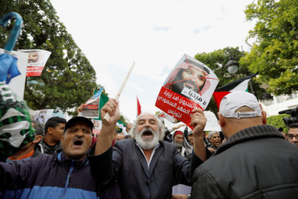 A man reacts as he takes part in a protest opposing the visit of Saudi Arabia's Crown Prince Mohammed bin Salman in Tunis, Tunisia. Photo by Zoubeir Souissi/Reuters