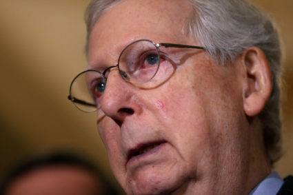 Senate Majority Leader Mitch McConnell stands back as shutdown drags on