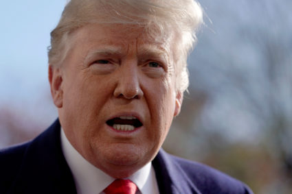 President Donald Trump talks to reporters as he departs on travel to the G20 Summit in Argentina from the White House in Washington, D.C. Photo by Jonathan Ernst/Reuters