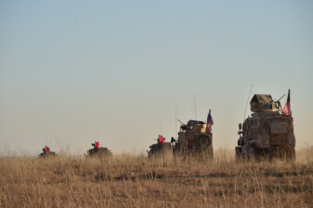 Turkish and U.S. troops are pictured during a joint patrol around Manbij, northern Syria. Picture taken Nov. 1, 2018. Phot...