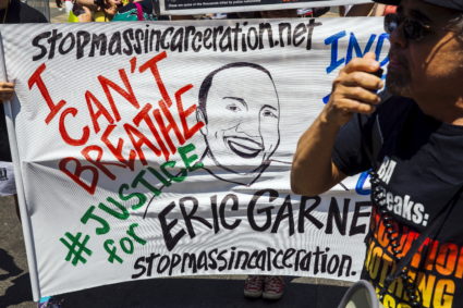 Protesters rally and speak out on the one year anniversary of the death of Eric Garner in New York, July 17, 2015. Family and supporters on Friday marked the one-year anniversary of the chokehold death of Eric Garner with rallies and vigils demanding police reforms and justice in the controversial case. Photo by Lucas Jackson/Reuters