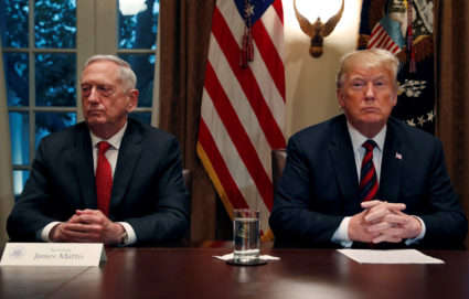 President Donald Trump speaks to the news media while gathering for an October briefing from his senior military leaders, including Defense Secretary James Mattis (L), in the Cabinet Room at the White House in Washington, D.C. Photo by Leah Millis/Reuters