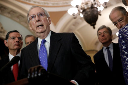 Senate Majority Leader Mitch McConnell, accompanied by Sen. John Barasso (R-WY), Sen. Roy Blunt (R-MO) and Sen. Chuck Grassley (R-IA), speaks with reporters following leadership elections at the U.S. Capitol in Washington, D.C. Photo by Aaron P. Bernstein/Reuters