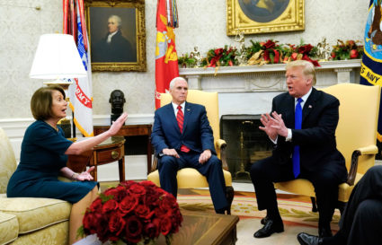 House Speaker designate Nancy Pelosi (D-Calif.) speaks with Vice President Mike Pence and U.S. President Donald Trump as they meet with her and Senate Minority Leader Chuck Schumer (D-N.Y.) in the Oval Office at the White House in Washington, D.C. Photo by Kevin Lamarque/Reuters