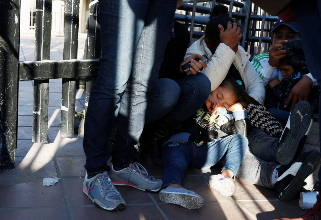 The daughter of Maria Meza, a 40-year-old migrant woman from Honduras, part of a caravan of thousands from Central America...