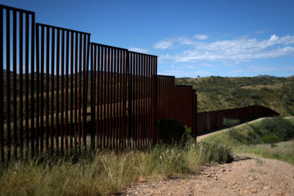 Different generations of the U.S. border wall with Mexico are seen from the United States in Nogales, Arizona, on Sept. 13, 2018. REUTERS/Adrees Latif/File Photo
