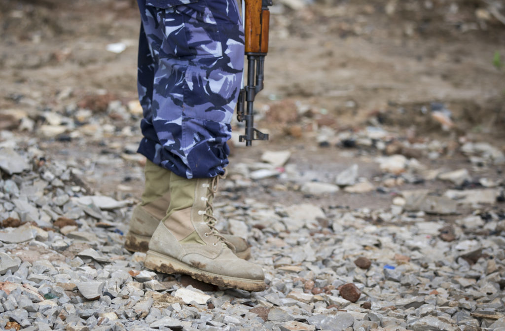 Baidoa, Somalia - May 01: Close-up of a former militia fighter with a gun in the rehabilitation center for former Al-Shaba...