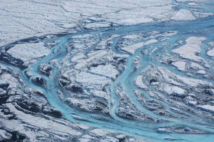 Large rivers form on the surface of Greenland each summer, rapidly moving meltwater from the ice sheet to the ocean. Image and caption by Sarah Das/Woods Hole Oceanographic Institution