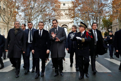 France's President Emmanuel Macron, France's Interior Minister Christophe Castaner, Secretary of State to the Interior Minister Laurent Nunez, and Paris police prefect Michel Delpuech arrive to visit firefighters and riot police officers the day after a demonstration, in Paris, France December 2, 2018. Thibault Camus/Pool via Reuters