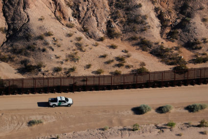 A U.S. border patrol truck drives along thew border fence between Mexico and Sunland Park, New Mexico. Officials say U.S. Boder Patrol agents found the girl who suffered seizures was found near Lordsburg, New Mexico. Photo by Mike Blake/Reuters