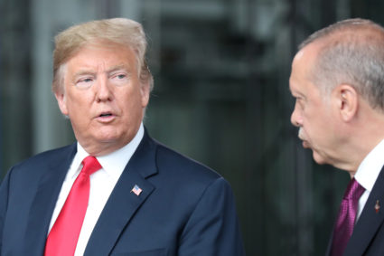 U.S. President Donald Trump talks to Turkeys President Recep Tayyip Erdogan at NATO headquarters in Brussels, Belgium July 11, 2018. Tatyana Zenkovich/Pool via REUTERS