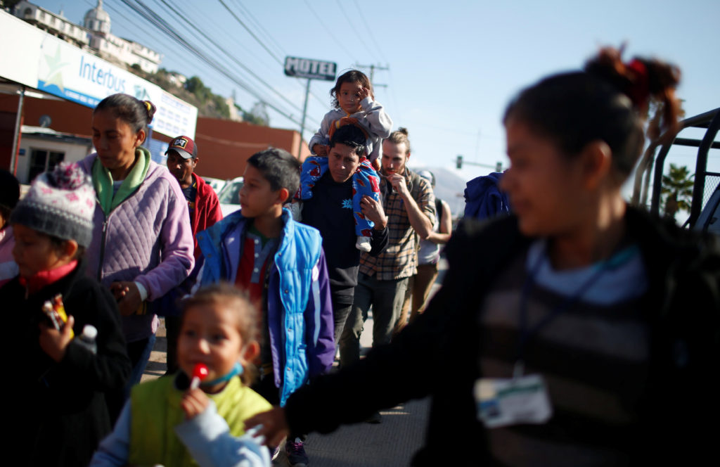 Migrants, part of a caravan of thousands from Central America trying to reach the United States, march demanding for more ...