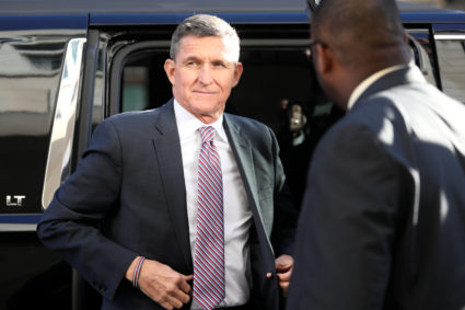Former national security adviser Michael Flynn exits a vehicle as he arrives for his sentencing hearing at U.S. District Court in Washington, D.C. Photo by Jonathan Ernst/Reuters