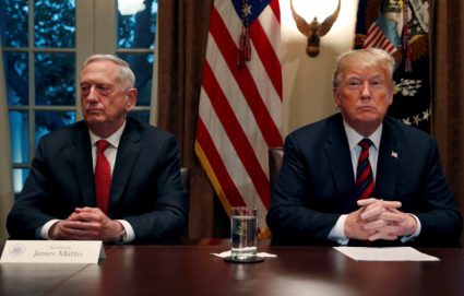 U.S. President Donald Trump speaks to the news media while gathering for a briefing from his senior military leaders, including Defense Secretary James Mattis (L), in the Cabinet Room at the White House in Washington, U.S., October 23, 2018. Photo by Leah Millis/Reuters