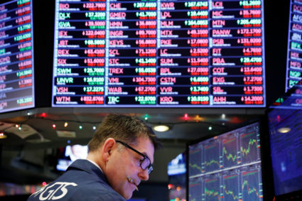 A trader works on the floor of the New York Stock Exchange shortly after the opening bell in New York, U.S., December 24, 2018. Photo by REUTERS/Lucas Jackson