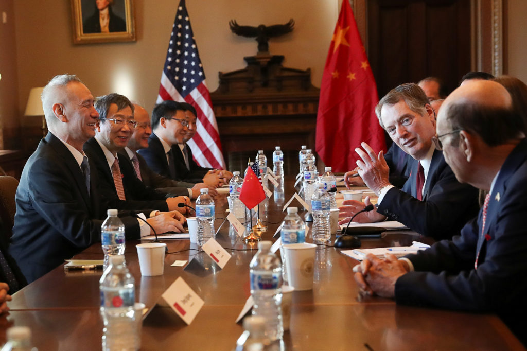 U.S. Trade Representative Robert Lighthizer (2ndR) speaks across from China's Vice Premier Liu He (L) during the opening o...